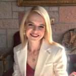 Headshot of Katie Lynn-Vecqueray