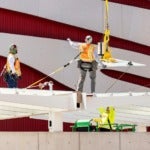 Workers toil at a construction site amid California's ongoing heat wave, in Los Angeles on July 3. (Etienne Laurent/AFP/Getty Images)