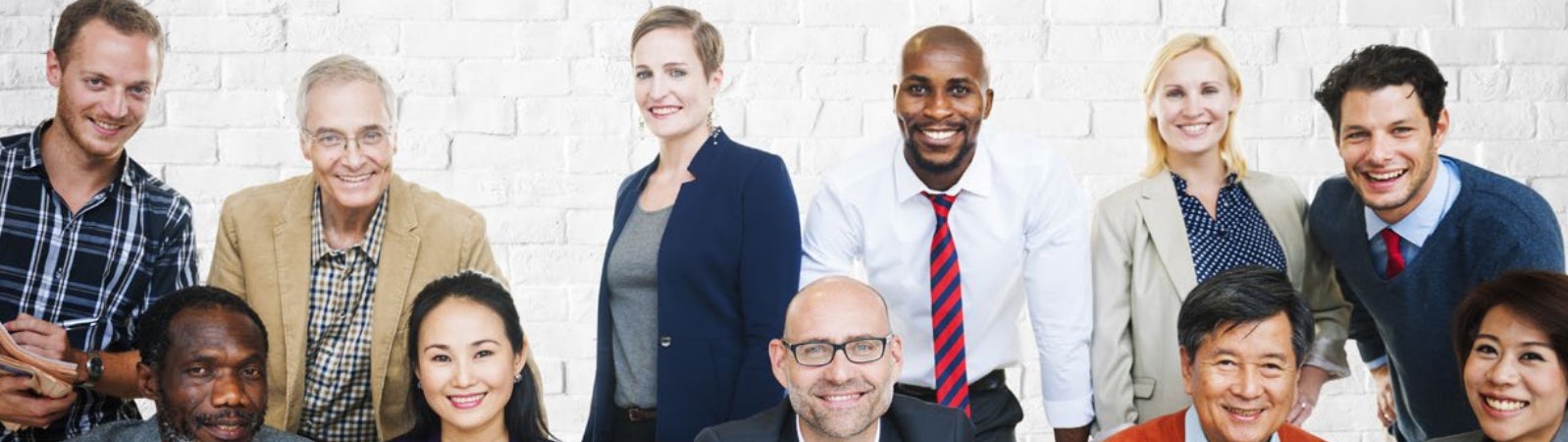 Group of employees sitting at a conference table