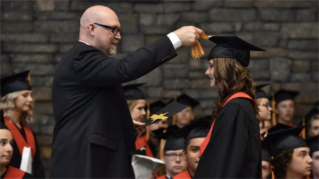 Students at graduation ceremony