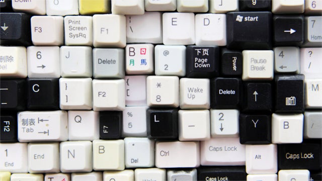 Random assortment of keys from multiple keyboards. Photograph by Bob/Getty Images.