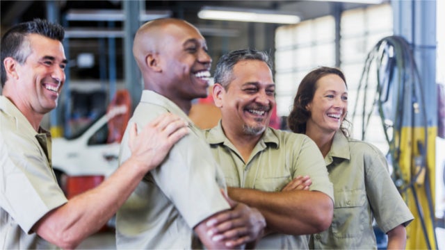 A group of smiling workers