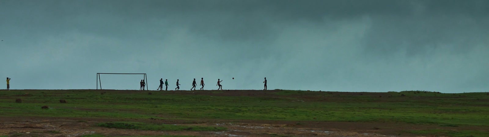 Kids playing football