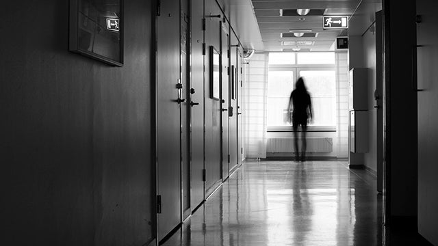 Person in hospital corridor
