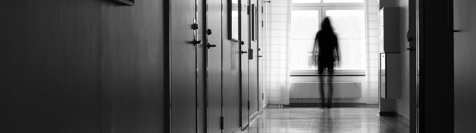 Person in hospital corridor