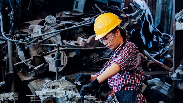 Woman working with machinery